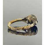 18TH CENTURY GOLD MOURNING RING, set with oval cut rock crystal and two rose cut diamond