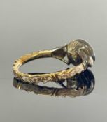 18TH CENTURY GOLD MOURNING RING, set with oval cut rock crystal and two rose cut diamond