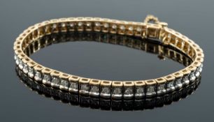 9CT GOLD DIAMOND TENNIS BRACELET, square panel design, integrated clasp with safety chain, 2.0cts