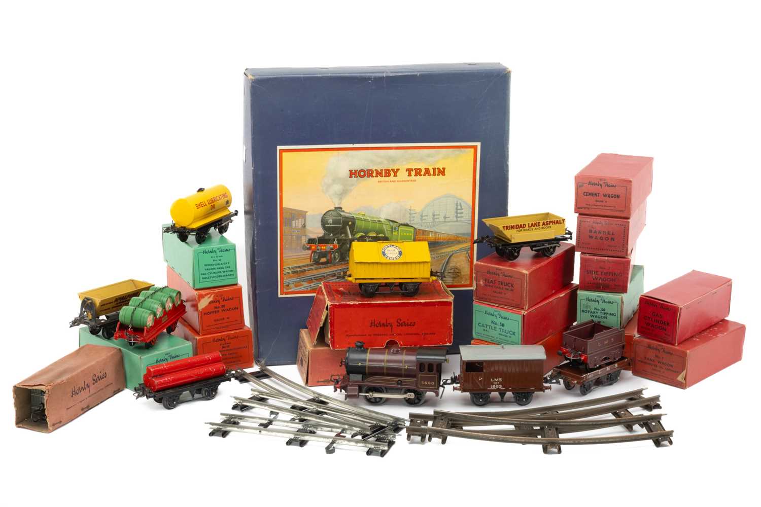 HORNBY TRAINS O GAUGE NO.601 GOODS SET, engine 5600 with three wagons, clock work, tin plate,