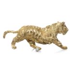 YELLOW METAL & DIAMOND TIGER BROOCH, modelled striding with ruby chip eyes, stamped '18K', 17g, 5.