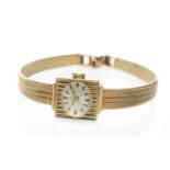 14K GOLD LADY'S WRISTWATCH, the small oval dial marked 'Walker & Hall', hour baton markers,