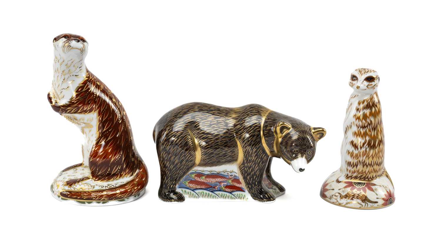 ROYAL CROWN DERBY PAPERWEIGHT FIGURES, comprising Grizzly Bear MMIX, Playful Otter MMIX, Meerkat