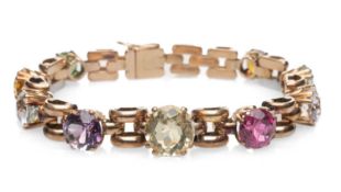 YELLOW METAL MULTI-GEM BRACELET, set with nine graduated semi-precious gems, brick link, 18cms long,