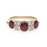 18CT GOLD RUBY & DIAMOND SEVEN STONE RING, ring size L, 3.1gms Provenance: Torfaen County Borough