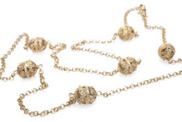 9CT GOLD ORB LINK CHAIN, the six filigree orbs connected by circle links, 70cms long, 19.4gms