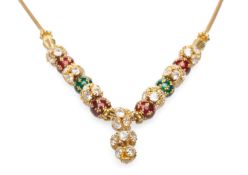 YELLOW METAL NECKLACE set with white semi-precious gem stones and enamel spheres, stamped '09.160'