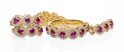 18CT GOLD RUBY & DIAMOND JEWELLERY comprising ring, pair of earrings, pendant on chain, stamped '