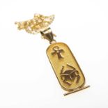 YELLOW METAL EGYPTIAN DESIGN PENDANT on fine 18ct gold chain, 6.6gms Provenance: Torfaen County