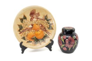 TWO WALTER MOORCROFT ORNAMENTS, comprising 'birds and fruit' charger 35cms (diam.), and 'anemone'