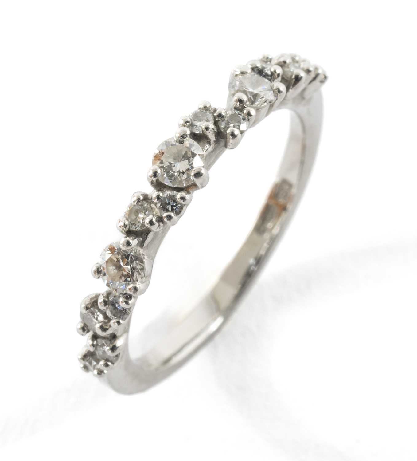 15-STONE PLATINUM & DIAMOND HALF HOOP RING, Pravins Ltd., ring size I/J, tot diamond wt appr 0.