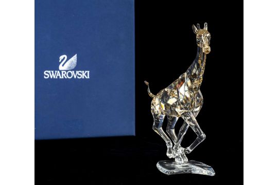 SWAROVSKI CRYSTAL RARE ENCOUNTERS GIRAFFE RUNNING, model no.935896, partially coated body in