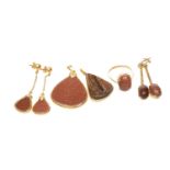 GROUP OF GOLDSTONE ITEMS OF JEWELLERY comprising ring, two pendants and pair of earrings stamped '