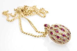 18CT GOLD RUBY & DIAMOND ENCRUSTED PENDANT, stamped 'Pravins' and '750' on 9ct gold chain, 7.2gms