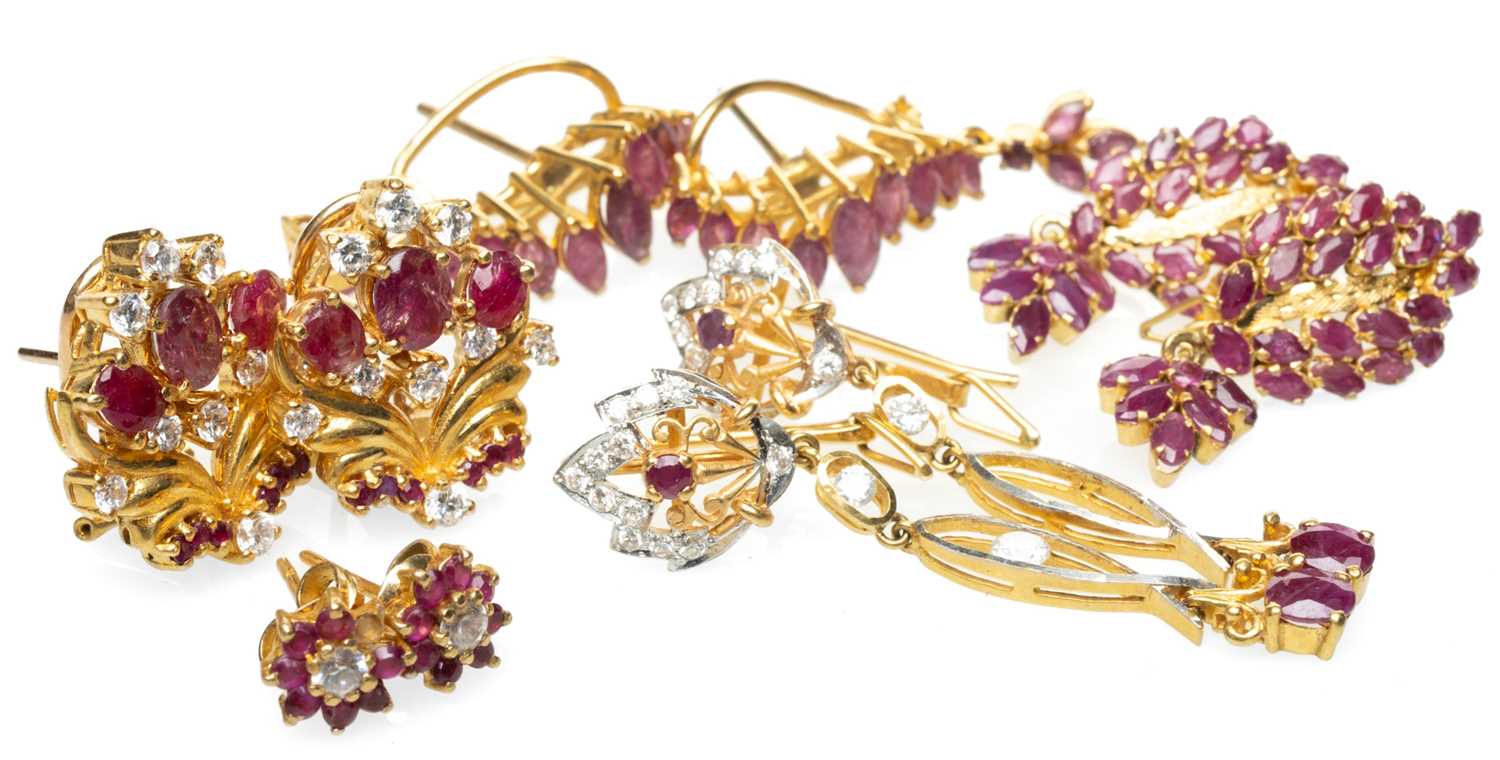 FIVE PAIRS OF YELLOW METAL & PINK GEM STONE EARRINGS, some believed rubies with white gem accent