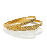 THREE SIMILAR YELLOW METAL BANGLES, all stamped '22K', 44.8gms gross (3) Provenance: deceased estate