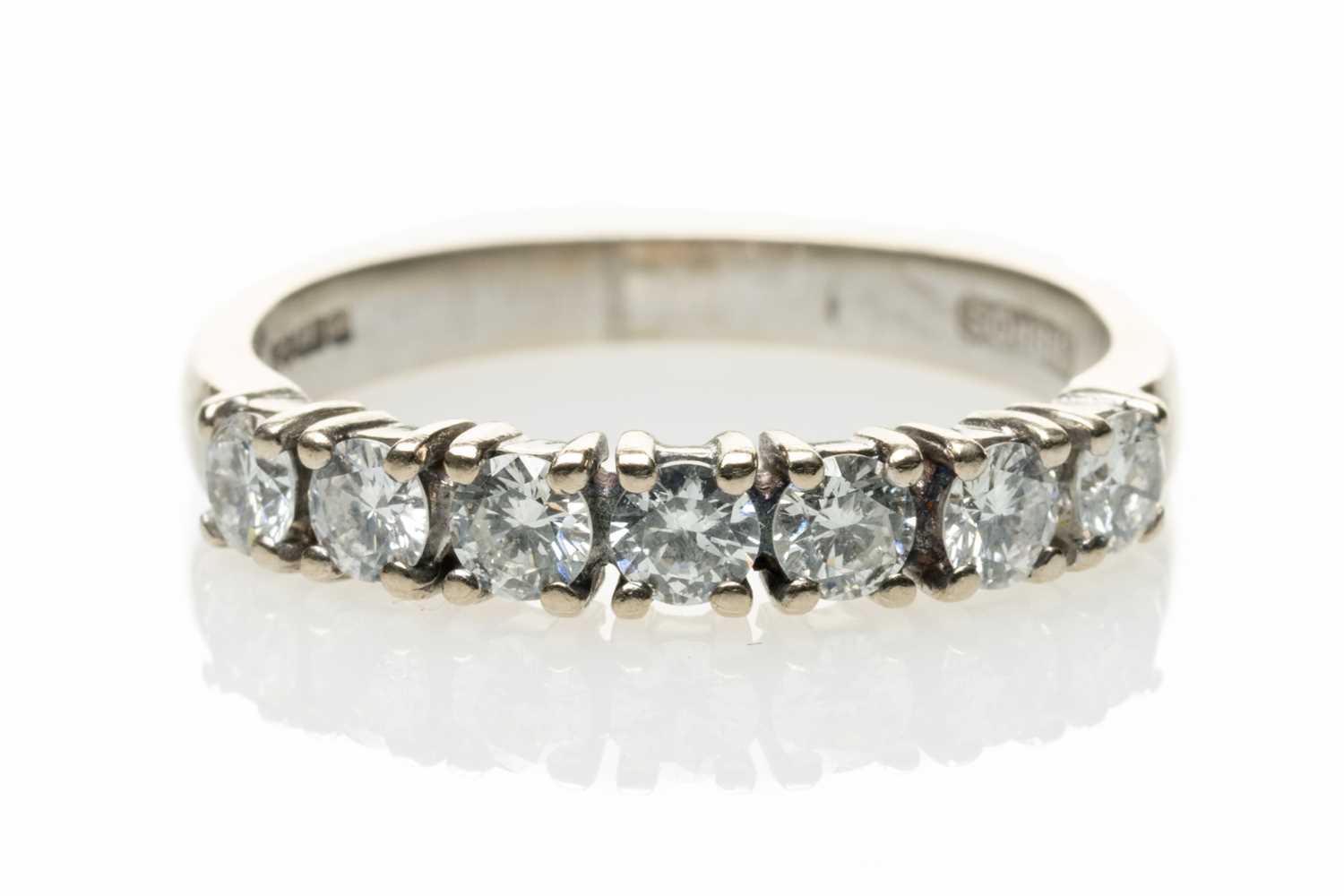 18CT WHITE GOLD SEVEN STONE DIAMOND RING, each stone 0.07cts approx., ring size O, 4.0gms