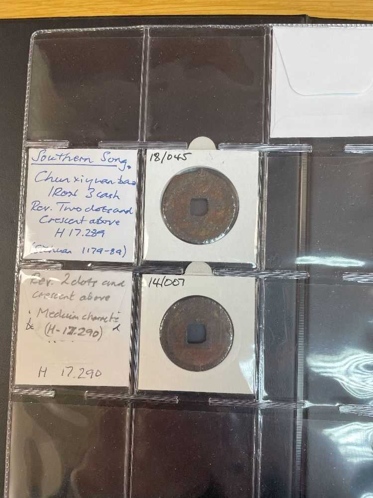 THREE COIN ALBUMS containing various believed Chinese Northern and Southern Song Dynasty iron coins, - Image 11 of 29