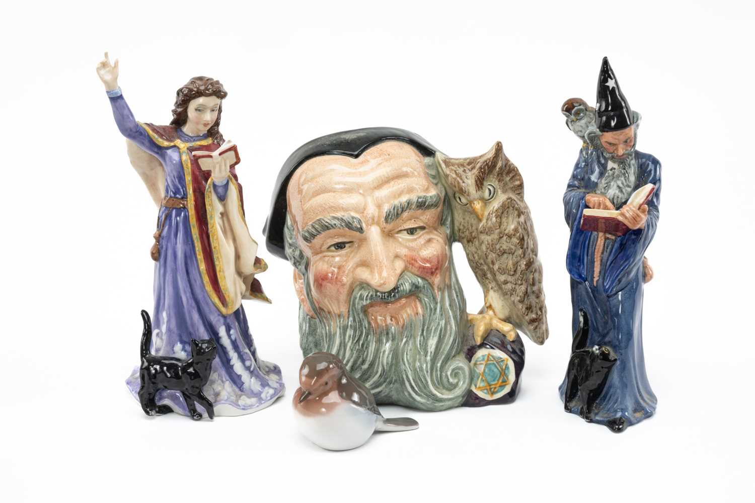 ROYAL DOULTON JUG & FIGURES, comprising 'The Wizard' HN 2877, 'The Sorceress' HN 4253, ' Merlin'