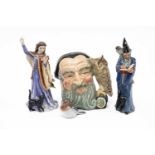 ROYAL DOULTON JUG & FIGURES, comprising 'The Wizard' HN 2877, 'The Sorceress' HN 4253, ' Merlin'