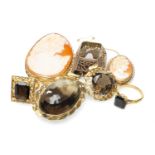 GROUP OF SMOKY QUARTZ JEWELLERY comprising three yellow metal set pendants (one stamped '22K'),