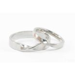 PAIR PLATINUM 'HIS & HERS' WEDDING BANDS, Pravins Ltd., London 2012, with twisted shank, ring