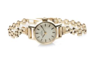 9CT GOLD LADY'S OMEGA AUTOMATIC WRISTWATCH, the circular dial with hour baton markers, inner back