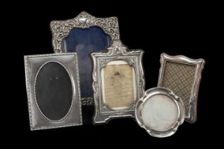 FIVE SILVER PHOTOGRAPH FRAMES, various shapes and sizes (5) Provenance: private collection Rhondda