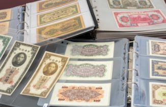 THREE ALBUMS OF WELL PRESENTED CHINESE BANK NOTES, predominantly mid 20th century, various