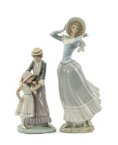 TWO LLADRO PORCELAIN FIGURINES, Spring Breeze 4936, 36cms (h) and Comforting Her Daughter 5142,