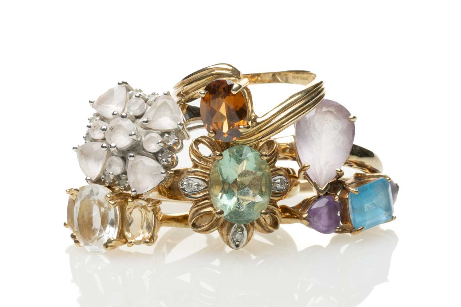 SIX 9CT GOLD GEM SET RINGS including morganite and diamond, Swiss blue topaz and amethyst,