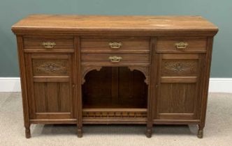 EDWARDIAN OAK SIDEBOARD BASE with four drawers and flanking cupboards to a central dog kennel