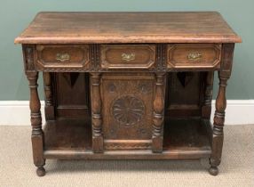 ANTIQUE CARVED OAK DRESSER BASE of narrow proportions and with centre cupboard below three