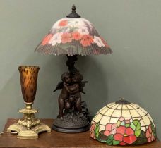 ART GLASS TABLE LAMPS the principal Tiffany style lamp with cherub base and floral shade, 58cms (h),