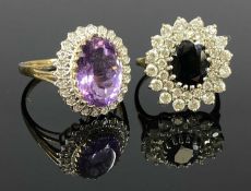 TWO 9CT GOLD CLUSTER RINGS, first with large central amethyst, second with central sapphire, sizes U