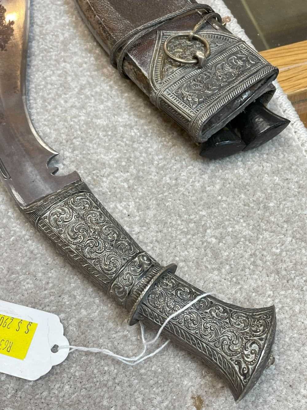 CEREMONIAL KUKRI, Nepal, 28cm poilished steel blade, floral embossed white metal hilt and pommel, - Bild 11 aus 16