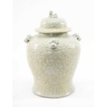 CHINESE MING-STYLE JAR & COVER, decorated in shallow relief with foliage, base with apocryphal 6-
