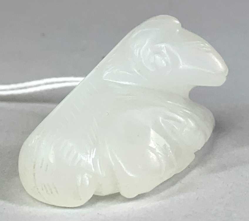 CHINESE WHITE JADE CARVING OF GOAT & KID, late Qing Dynasty or later, the recumbent adult beside - Image 2 of 4