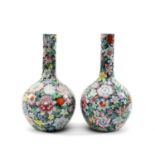 PAIR CHINESE FAMILLE ROSE 'MILLE FLEURS' VASES, Republic or later, bottle form profusely enamelled
