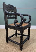 RARE ANGLO-INDIAN EBONY ARMCHAIR, 19th Century, Coromandel Coast, carved allover in shallow relief