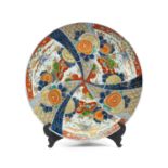 JAPANESE IMARI PORCELAIN CHARGER, Meiji Period, decorated in 5-colours with radiating panels of