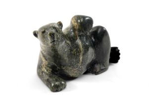 JAMASIE, mottled green steatite - Recumbent Polar Bear, signed in syllabics, Iqaluit, 1994, 11.