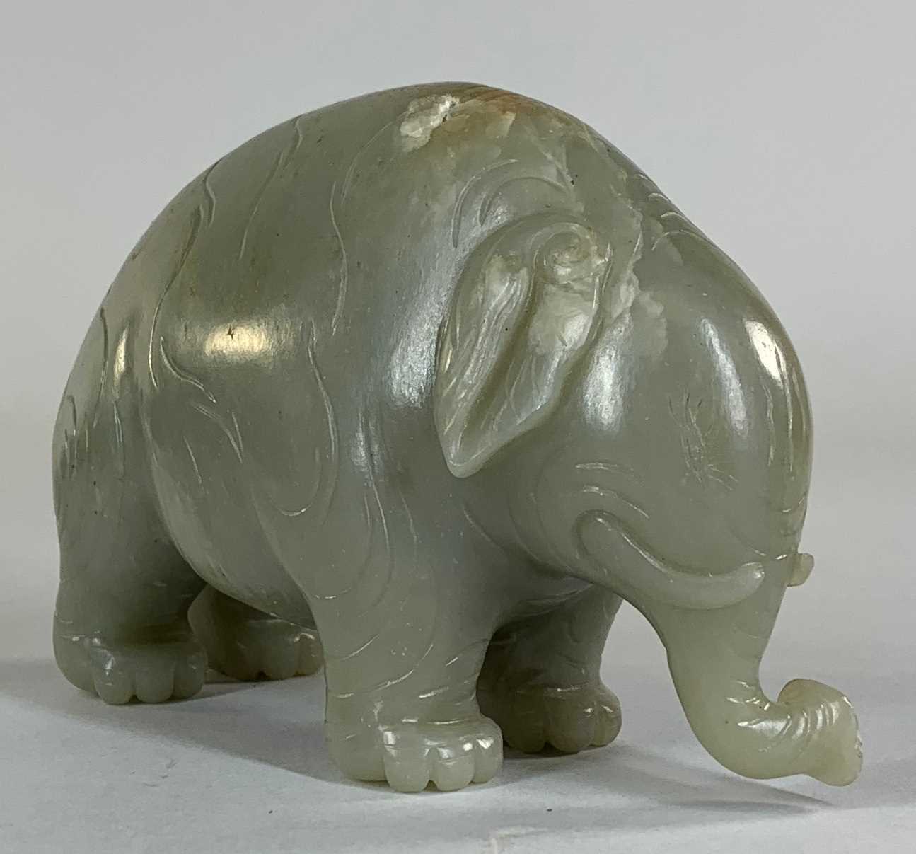 CHINESE CELADON JADE CARVING OF AN ASIAN ELEPHANT, late Qing Dynasty, standing with head lowered and - Image 7 of 17