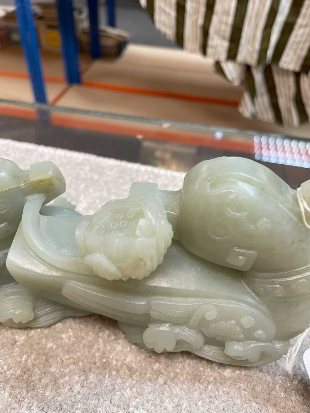 CHINESE CELADON JADE CARVING OF MANDARIN DUCKS, late Qing Dynasty, swimming on a pond with stems - Image 10 of 19