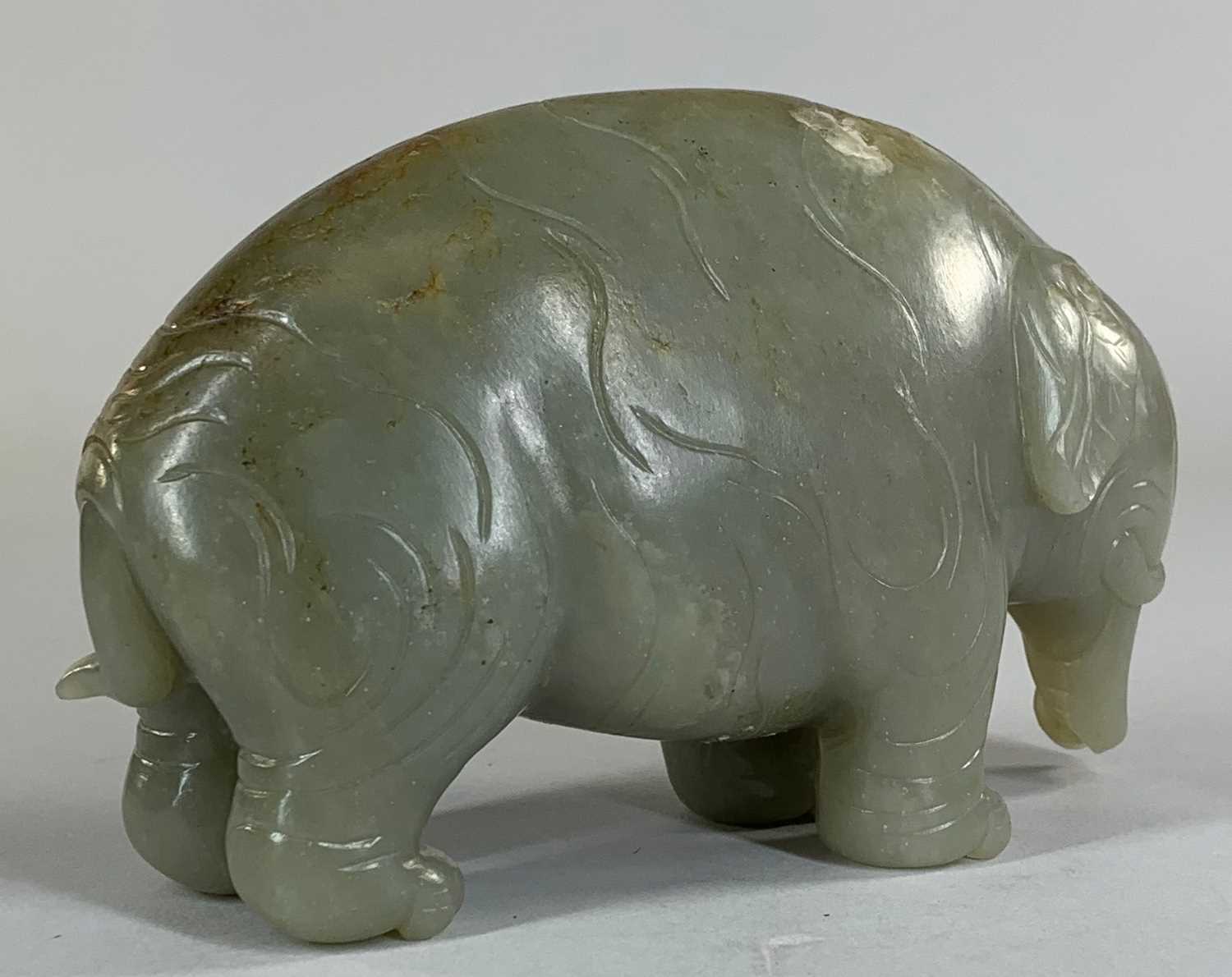 CHINESE CELADON JADE CARVING OF AN ASIAN ELEPHANT, late Qing Dynasty, standing with head lowered and - Image 8 of 17