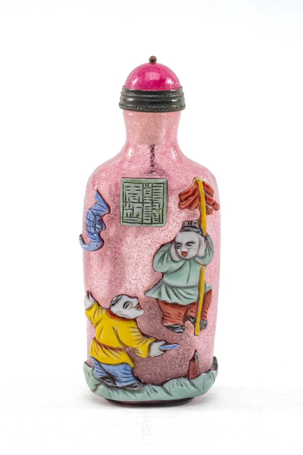 CHINESE OVERLAY GLASS SNUFF BOTTLE, Qing dynasty or later, carved in relief with children lighting