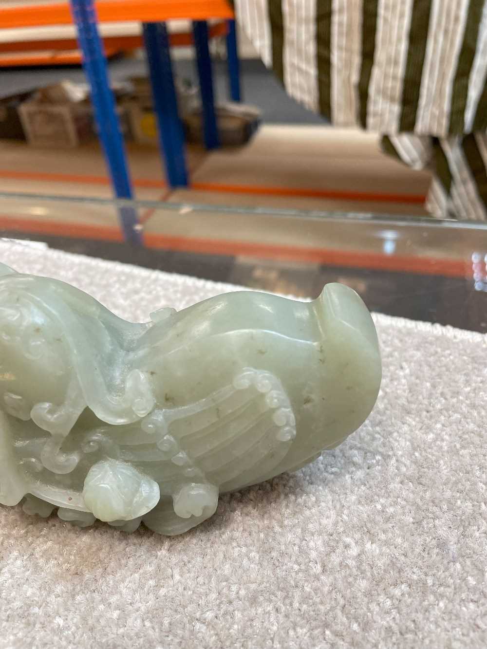 CHINESE CELADON JADE CARVING OF MANDARIN DUCKS, late Qing Dynasty, swimming on a pond with stems - Image 13 of 19