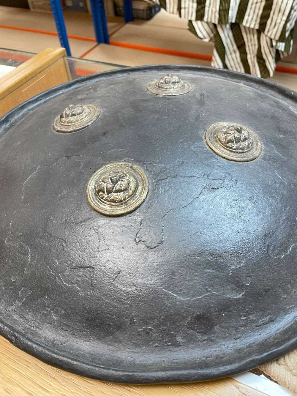 INDIAN LACQUERED DHAL, shield of circular convex form with out turned rim, having four brass lion - Image 4 of 12