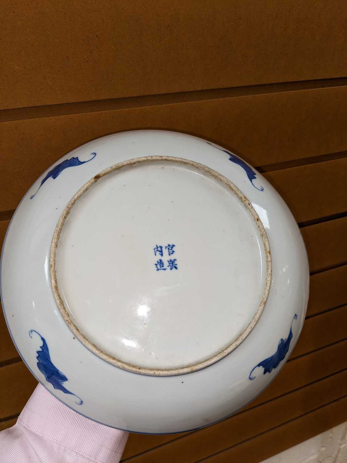 TWO SIMILAR CHINESE BLUE & WHITE 'LOTUS' SAUCER DISHES, painted in the Ming-style, one painted - Image 5 of 7
