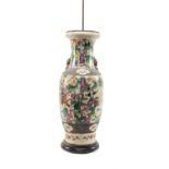 LARGE CHINESE CRACKLE GLAZE VASE, painted in famille rose enamels with warrioirs, converted for